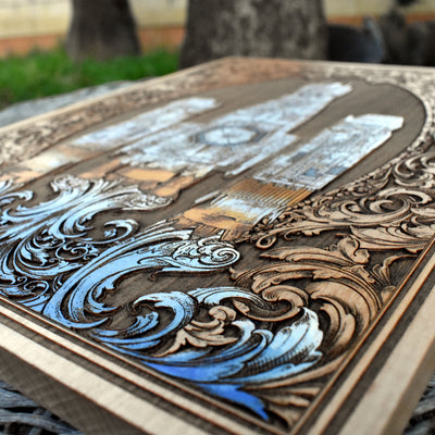 Detailed laser engraving of Alien's Nostromo on dark maple wood.