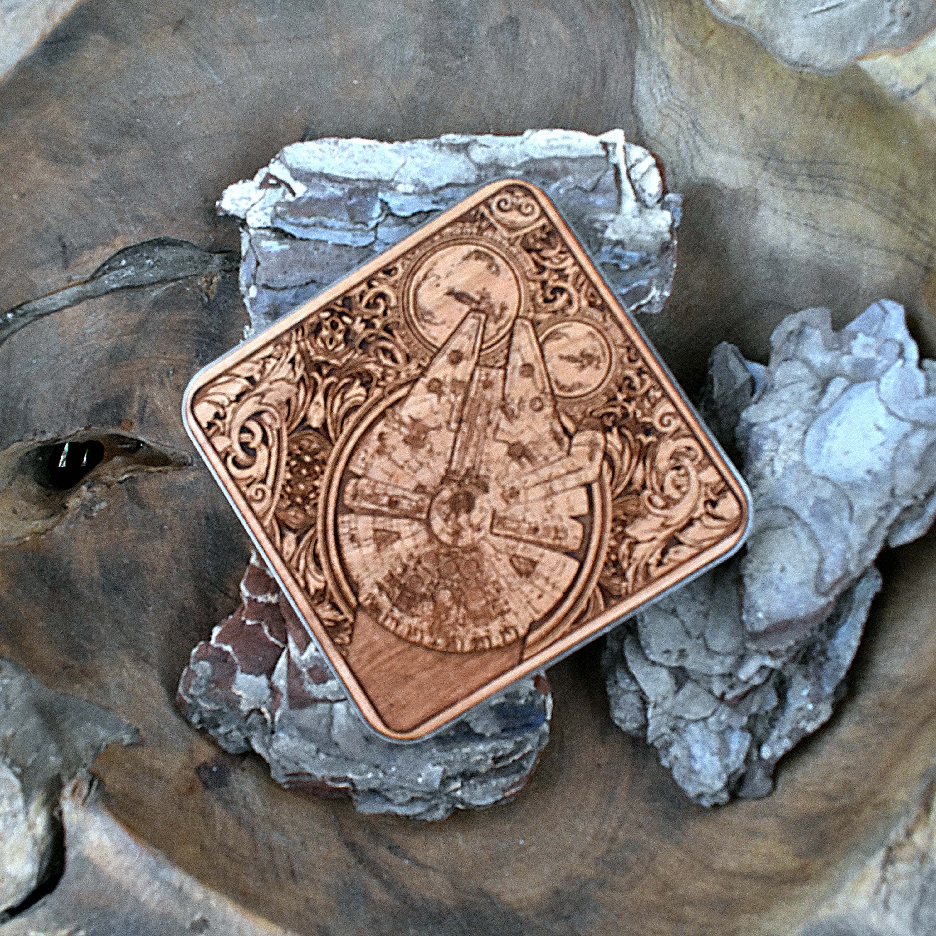 Side view of galaxy ship art on wood wireless charger.