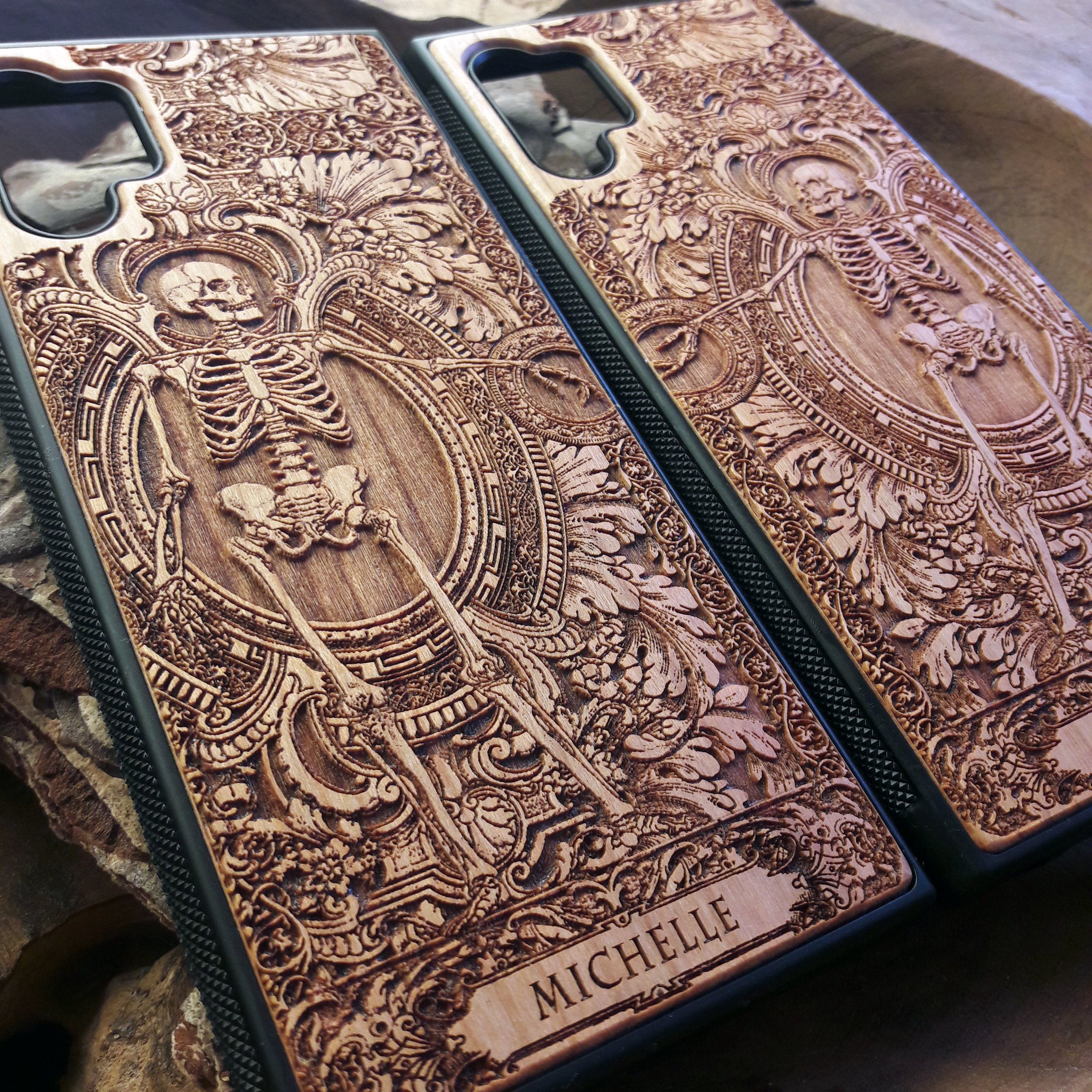 Personalized wood phone case featuring a skeleton design with custom names "Michelle" and "Jannik," ideal for iPhone 16 and Samsung Galaxy S25 users looking for unique and durable phone protection.