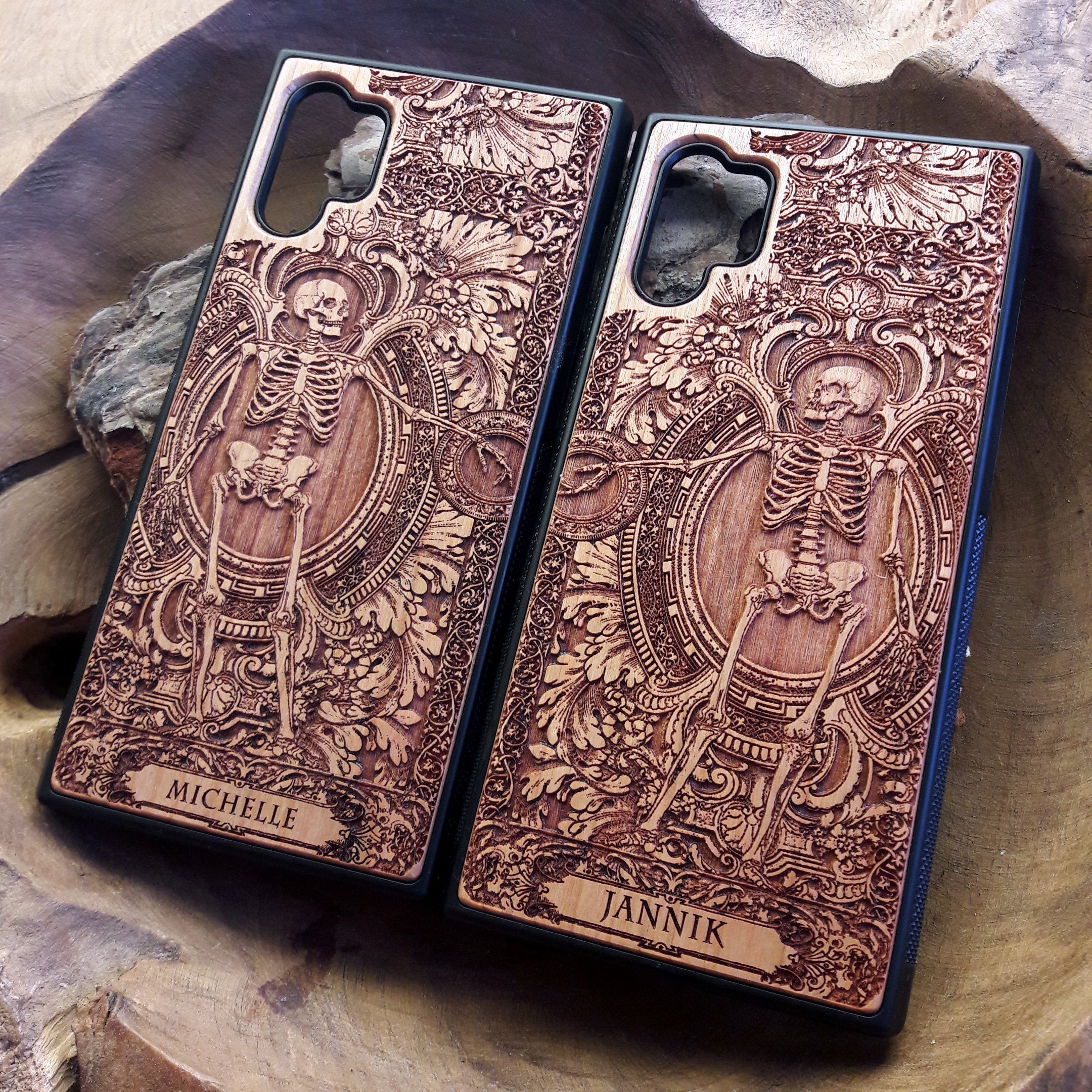 Personalized wood phone case featuring a skeleton design with custom names "Michelle" and "Jannik," ideal for iPhone 16 and Samsung Galaxy S25 users looking for unique and durable phone protection.