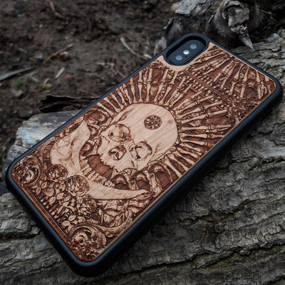 Wooden phone case with intricate gothic skull design, available for iPhone , iPhone 15, Galaxy S, Note 20, and more. Ideal for horror lovers and fans of unique, handcrafted accessories.
