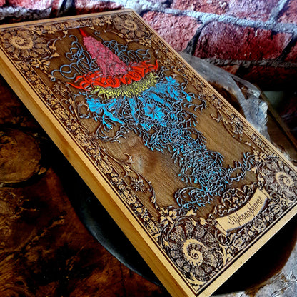 Engraved wooden art featuring Ernst Haeckel’s sea creature sketches