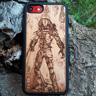 Wooden phone case featuring a detailed Predator Monster design, engraved for iPhone , iPhone 15, Galaxy S23 Ultra, and other popular models. Perfect for sci-fi and movie fans, offering stylish protection.