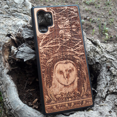 Laser-engraved wooden phone case with intricate owl design, celestial moon accents, for iPhone , iPhone 15, iPhone 14, iPhone 13, iPhone 12, iPhone 11, iPhone  Pro Max, iPhone  Mini, Samsung Galaxy S, Samsung Galaxy S24, Samsung Galaxy S23, Samsung Galaxy S22, Samsung Galaxy S21, Samsung Galaxy S20 Ultra, Samsung Galaxy S20 Plus, Samsung Galaxy Note 20. Nature-inspired, durable, and unique.