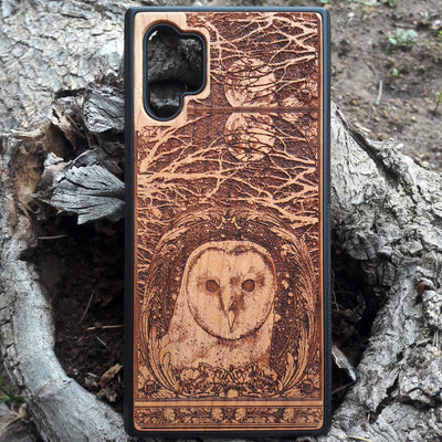 Laser-engraved wooden phone case with intricate owl design, celestial moon accents, for iPhone , iPhone 15, iPhone 14, iPhone 13, iPhone 12, iPhone 11, iPhone  Pro Max, iPhone  Mini, Samsung Galaxy S, Samsung Galaxy S24, Samsung Galaxy S23, Samsung Galaxy S22, Samsung Galaxy S21, Samsung Galaxy S20 Ultra, Samsung Galaxy S20 Plus, Samsung Galaxy Note 20. Nature-inspired, durable, and unique.