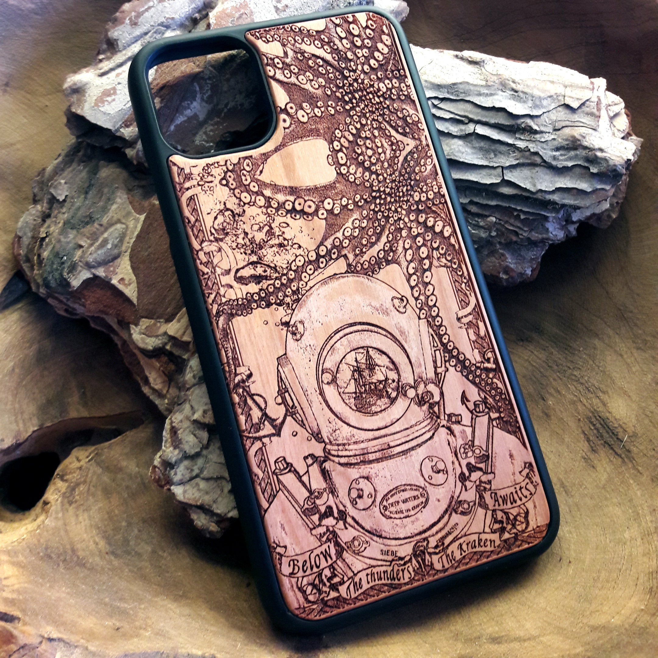 Wooden phone case featuring a detailed deep-sea diver and kraken design, laser-engraved for iPhone 16, iPhone 15, Samsung Galaxy S25, and other models. A must-have for fans of nautical and mythical art.