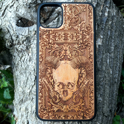Skull and ram horns laser-engraved wooden phone case for iPhone & Samsung Galaxy – Compatible with iPhone  and Samsung Galaxy S

This optimization focuses on the dark, gothic, and alternative elements of the design, including the skull and ram horns theme, while also highlighting the compatibility with both iPhone and Samsung Galaxy models for better search engine visibility.