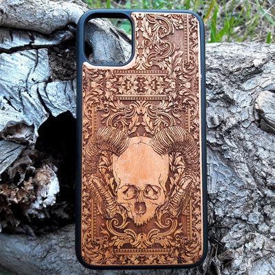 Skull and ram horns laser-engraved wooden phone case for iPhone & Samsung Galaxy – Compatible with iPhone  and Samsung Galaxy S

This optimization focuses on the dark, gothic, and alternative elements of the design, including the skull and ram horns theme, while also highlighting the compatibility with both iPhone and Samsung Galaxy models for better search engine visibility.