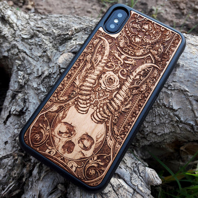 Laser-engraved Beelzebub-inspired phone case with skull and ram’s horns, Gothic occult design for iPhone  and Samsung Galaxy S, featuring intricate details and a slim, protective fit. Perfect for Gothic and occult art lovers.