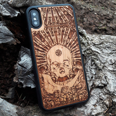 Wooden phone case with intricate gothic skull design, available for iPhone , iPhone 15, Galaxy S, Note 20, and more. Ideal for horror lovers and fans of unique, handcrafted accessories.