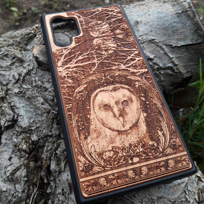 Laser-engraved wooden phone case with intricate owl design, celestial moon accents, for iPhone , iPhone 15, iPhone 14, iPhone 13, iPhone 12, iPhone 11, iPhone  Pro Max, iPhone  Mini, Samsung Galaxy S, Samsung Galaxy S24, Samsung Galaxy S23, Samsung Galaxy S22, Samsung Galaxy S21, Samsung Galaxy S20 Ultra, Samsung Galaxy S20 Plus, Samsung Galaxy Note 20. Nature-inspired, durable, and unique.