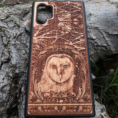 Laser-engraved wooden phone case with intricate owl design, celestial moon accents, for iPhone , iPhone 15, iPhone 14, iPhone 13, iPhone 12, iPhone 11, iPhone  Pro Max, iPhone  Mini, Samsung Galaxy S, Samsung Galaxy S24, Samsung Galaxy S23, Samsung Galaxy S22, Samsung Galaxy S21, Samsung Galaxy S20 Ultra, Samsung Galaxy S20 Plus, Samsung Galaxy Note 20. Nature-inspired, durable, and unique.