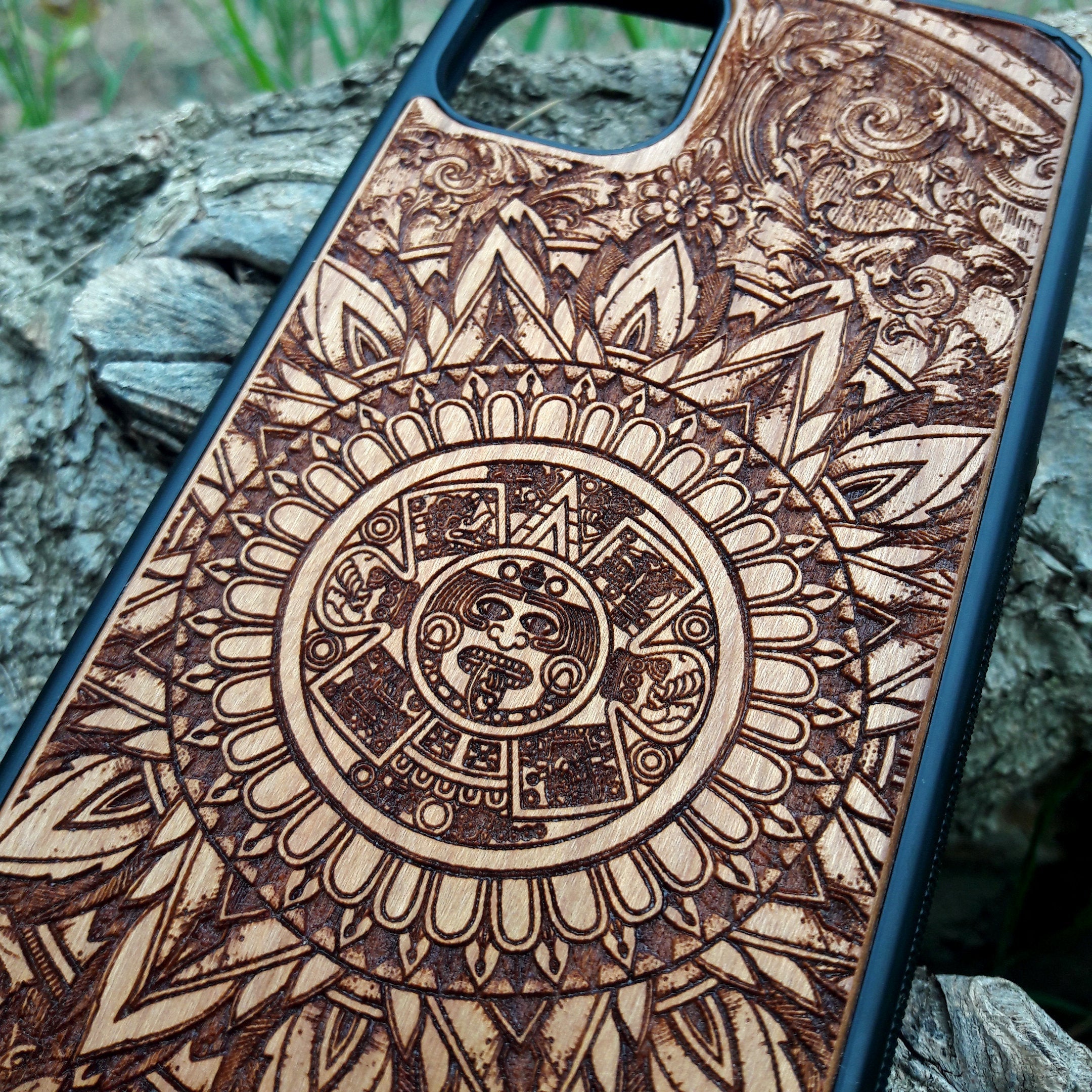 Wooden phone case featuring a detailed, laser-engraved Flower of Life design with intricate mandala patterns. Slim, durable, and compatible with iPhone 16, 15, 14, 13, 12, 11 Pro Max Mini and Samsung Galaxy S25, S24, S23, S22, S21, S20 Ultra Plus, Note 20. Perfect for those who appreciate sacred geometry and natural aesthetics.