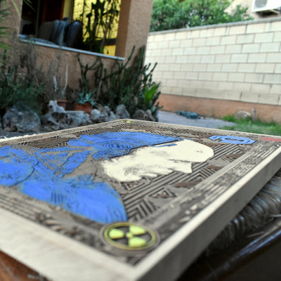 Laser-engraved Robocop design on wood, ideal collector’s art piece for 80s action lovers.