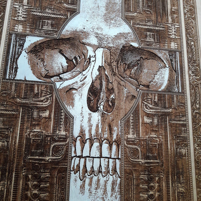 Dark-themed wooden art with skull and cross motif, handmade finish.