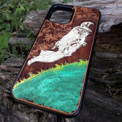 Hand-painted cherry wood phone case with vibrant green planet design.
