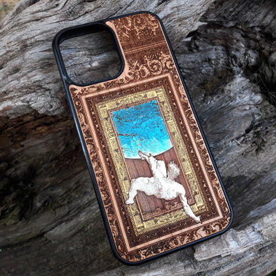 Laser-engraved Celtic Tree of Life design on a wooden phone case, compatible with iPhone and samsung galaxy