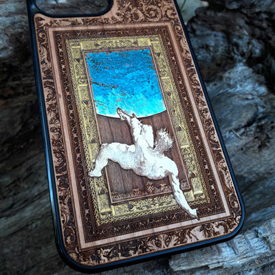 Laser-engraved Celtic Tree of Life design on a wooden phone case, compatible with iPhone and samsung galaxy