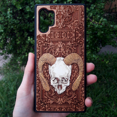 Laser-engraved wooden phone case for iPhone and samsung galaxy, featuring intricate gothic artwork