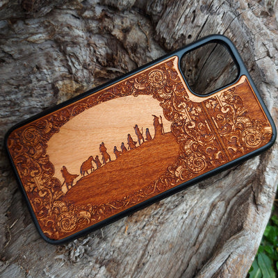 Lord of the Rings wood phone case featuring the Fellowship of the Ring silhouette and ornate border design. Laser-engraved for intricate detailing, this case combines durability with artistry. Compatible with iPhone , 15, 14, 13, 12, 11, Pro Max, Mini, and Samsung Galaxy S, S24, S23, S22, S21, S20 Ultra, Plus, Note 20. Perfect for Tolkien fans seeking a unique and protective accessory.
