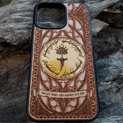 Lord of the Rings wood phone case featuring a stunning laser-engraved Tolkien design with intricate Elvish script and detailed patterns. Compatible with iPhone , iPhone 15, 14, 13, 12, 11 Pro Max Mini, and Samsung Galaxy S, S24, S23, S22, S21, S20 Ultra, Plus, Note 20. Durable, slim, and stylish, perfect for fans of Tolkien's Middle-Earth looking for a unique phone case.