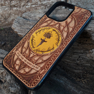 Lord of the Rings wood phone case featuring a stunning laser-engraved Tolkien design with intricate Elvish script and detailed patterns. Compatible with iPhone , iPhone 15, 14, 13, 12, 11 Pro Max Mini, and Samsung Galaxy S, S24, S23, S22, S21, S20 Ultra, Plus, Note 20. Durable, slim, and stylish, perfect for fans of Tolkien's Middle-Earth looking for a unique phone case.