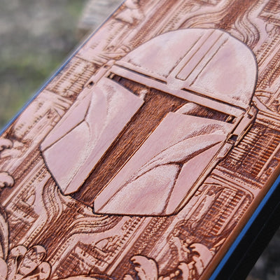 Star Wars Mandalorian helmet wood phone case, laser-engraved design featuring the iconic Mandalorian helmet, offering a unique, stylish look for iPhone , Samsung Galaxy S, and other models. Durable, slim, and perfect for Star Wars fans.