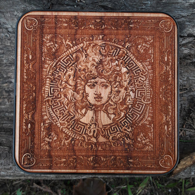 Hand-painted Medusa wireless charger with mythological artwork.