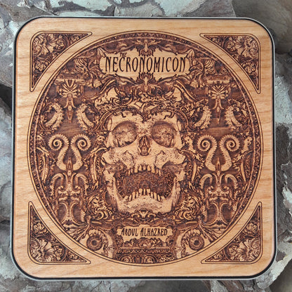 Hand-painted wooden wireless charger with Necronomicon design.