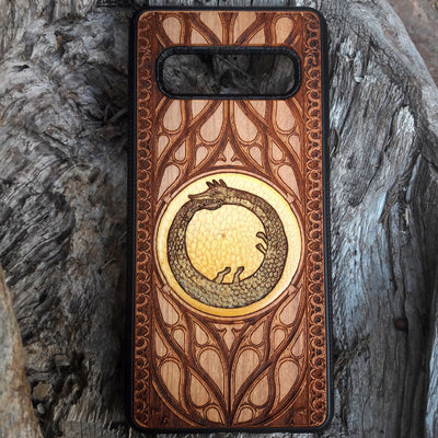 Celtic Triskelion Spiral wood phone case with laser-engraved design for iPhone & Samsung Galaxy. Compatible with iPhone , 15, 14, 13, 12, 11 Pro Max Mini & Samsung Galaxy S, S24, S23, S22, S21, S20 Ultra Plus Note 20. Unique and durable.