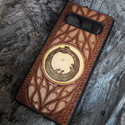 Celtic Triskelion Spiral wood phone case with laser-engraved design for iPhone & Samsung Galaxy. Compatible with iPhone , 15, 14, 13, 12, 11 Pro Max Mini & Samsung Galaxy S, S24, S23, S22, S21, S20 Ultra Plus Note 20. Unique and durable.