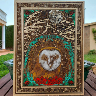 Rustic wood wall art featuring a laser-engraved owl in moonlight.