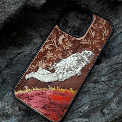 Hand-painted astronaut wooden phone case featuring a laser-engraved cosmic design on cherrywood. Compatible with iPhone -11 Pro Max, Galaxy S-S20. Sci-fi and space-themed phone case.