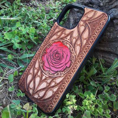 Laser-engraved red rose design on a wooden phone case, featuring intricate floral artwork, compatible with iPhone 16, iPhone 15, Galaxy S25, and more.