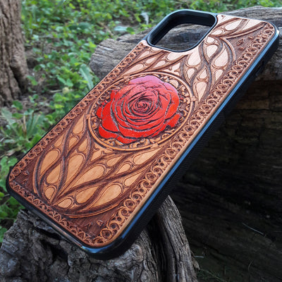 Laser-engraved red rose design on a wooden phone case, featuring intricate floral artwork, compatible with iPhone 16, iPhone 15, Galaxy S25, and more.