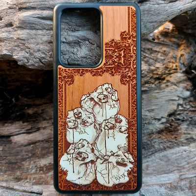 Hand-painted cherrywood phone case with laser-engraved skull pile design, compatible with iPhone -11 Pro Max and Samsung Galaxy S-S20 models.