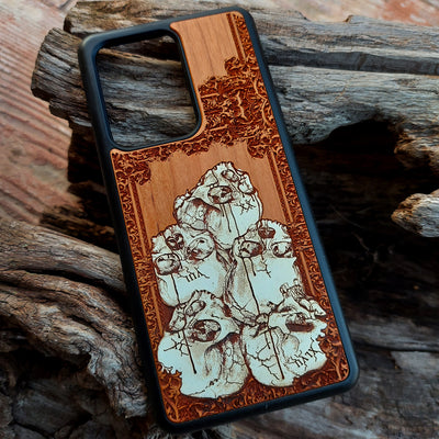 Hand-painted cherrywood phone case with laser-engraved skull pile design, compatible with iPhone -11 Pro Max and Samsung Galaxy S-S20 models.