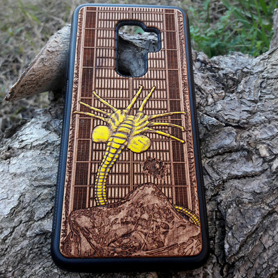 Laser-engraved wooden phone case for Samsung Galaxy and iphone, featuring intricate gothic artwork.