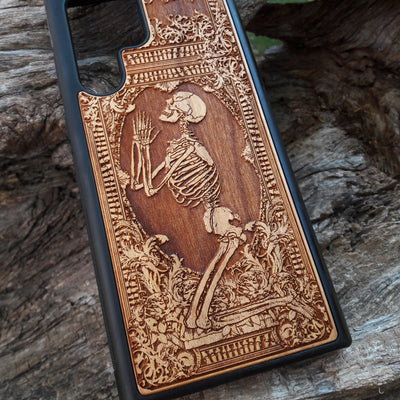 Shop our premium wooden phone cases designed for iPhone , iPhone 15, Galaxy S23, S22, Note 20, and more. Featuring intricate designs like the praying skeleton, it’s the perfect personalized gift for tech enthusiasts. Available for multiple iPhone and Galaxy models, these cases offer durable protection with style.