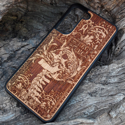 Wooden phone case with a detailed carved skull design from Scream, available for iPhone , iPhone 15, Galaxy S, Galaxy S24, and more. Perfect for fans of horror and gothic art, offering durability and unique style.