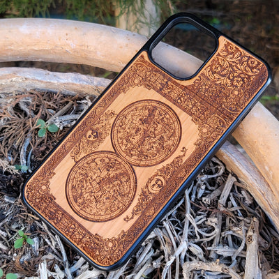 Wooden phone case featuring an intricate Earth map engraving, available for iPhone , Samsung Galaxy S, and more. Eco-friendly, unique design, ideal for lovers of travel and geography.