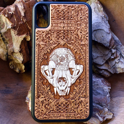 Laser-engraved "The Cursed" design featuring an evil cat skull on a wooden phone case, compatible with iPhone and samsung galaxy