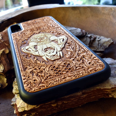 Laser-engraved "The Cursed" design featuring an evil cat skull on a wooden phone case, compatible with iPhone and samsung galaxy