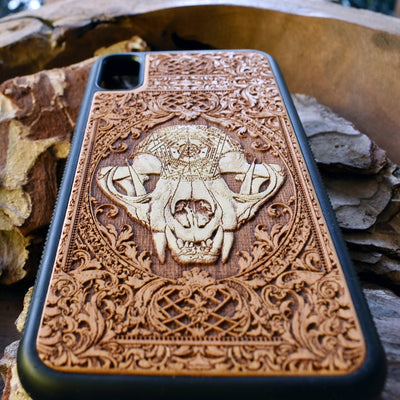 Laser-engraved "The Cursed" design featuring an evil cat skull on a wooden phone case, compatible with iPhone and samsung galaxy