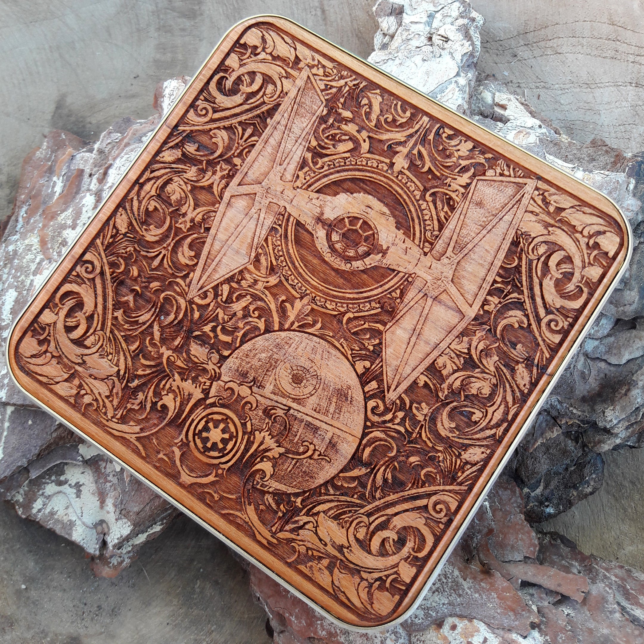 Handcrafted wireless charger featuring sci-fi starship engravings.