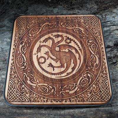 Close-up of Stark sigil painted on Game of Thrones wireless charger.
