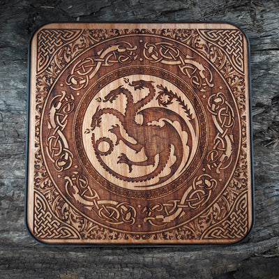 Hand-painted wooden wireless charger with Game of Thrones symbols.