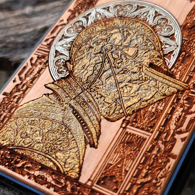 Hand-finished cherry wood phone case with detailed laser engraving, perfect for iPhone & Samsung Galaxy users.