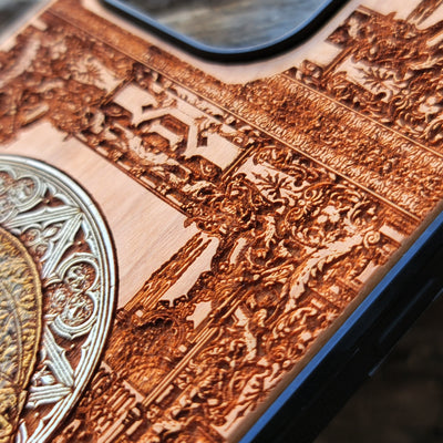 Hand-finished cherry wood phone case with detailed laser engraving, perfect for iPhone & Samsung Galaxy users.