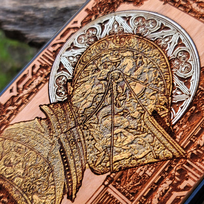 Close-up detail of artisanal hand-painted cherry wood phone case with bold Confession design